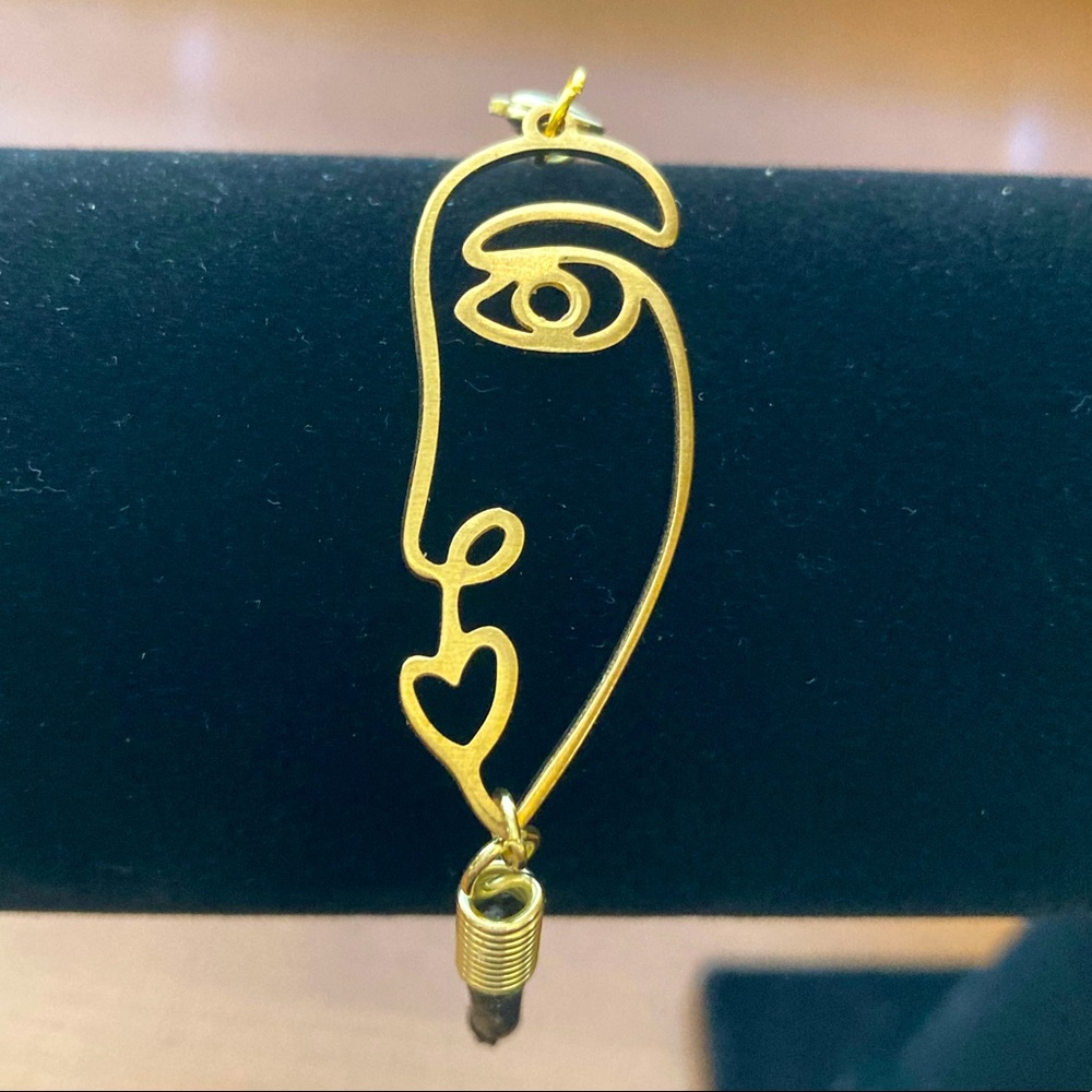 Abstract Face Pendant Bracelet with Leather Strap - Picture 1 of 12
